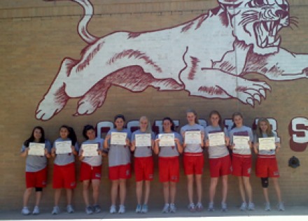 Volunteers from Chisholm Trail Middle School in Round Rock display their certificates from the State Track Meet.