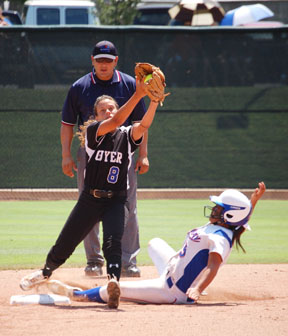 Junior Jenice Aloyo from Denton Guyer High School gets the force out during the 4A conference semifinal game against Waco Midway High School. Midway won the game 7-0 and went on to beat Magnolia High School for the 4A title, 1-0.